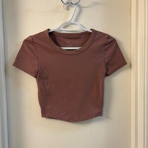Nike Dri-FIT Crop Top in Mauve